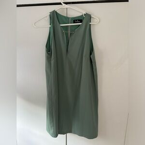 Sage shift dress with gold bar detail